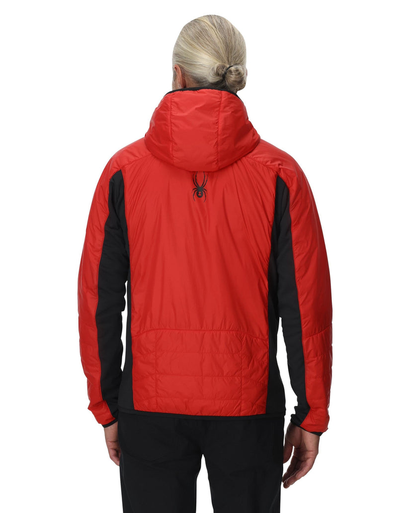 Person wearing a red and black jacket on a white background