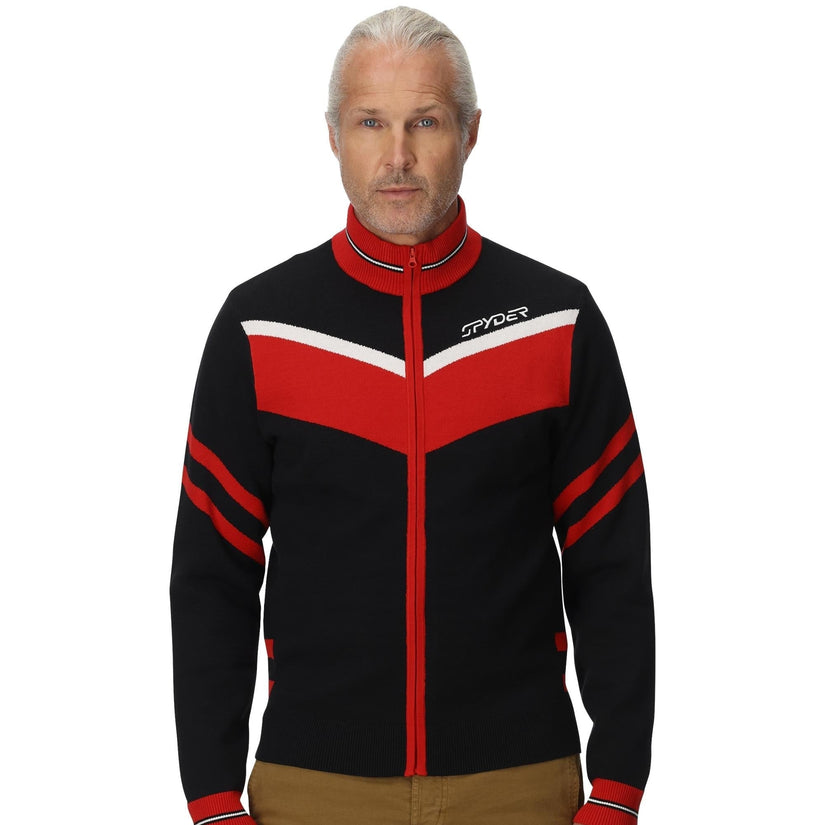 Man wearing a black and red jacket with Spyder logo on a white background