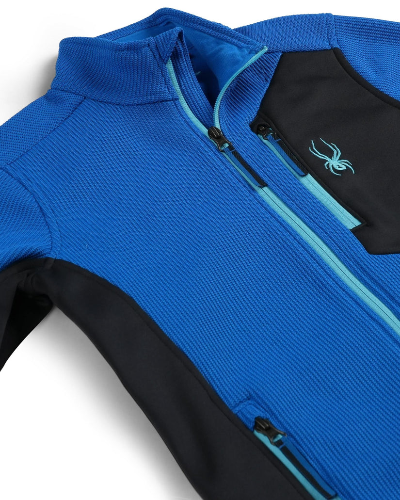 Blue and black jacket with a brand logo on a white background
