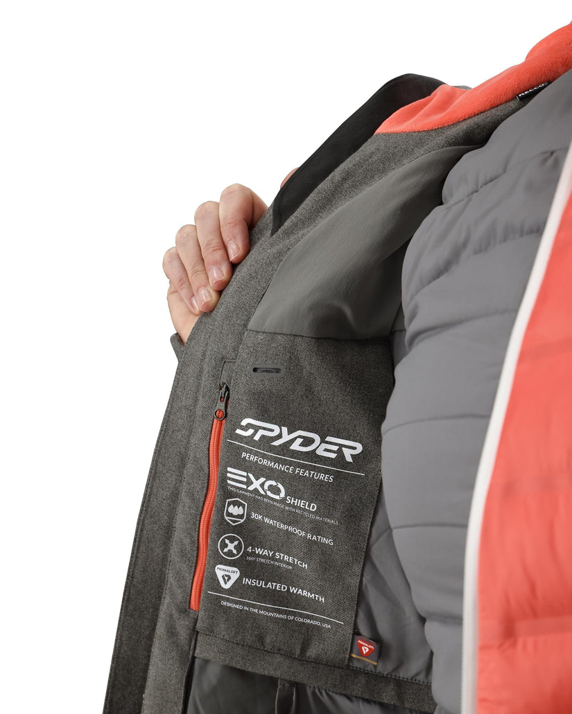 Close-up of a Spyder jacket with Exo Shield performance features on a white background