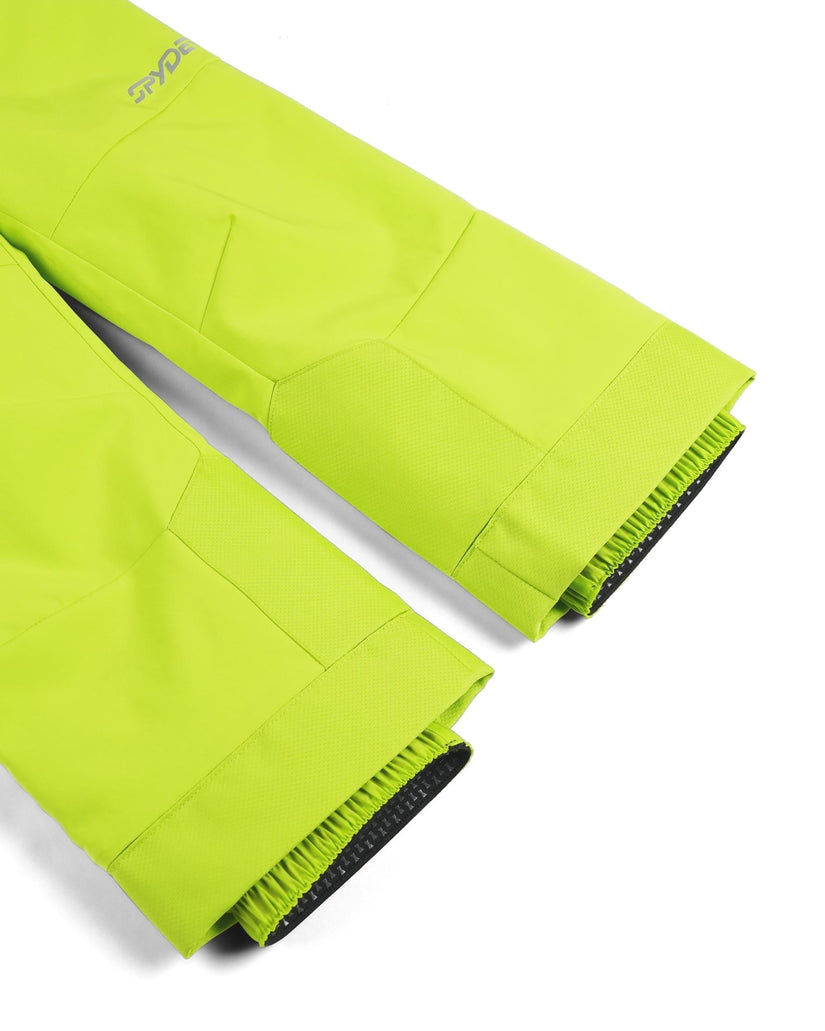 Green pants with black trim on a white background